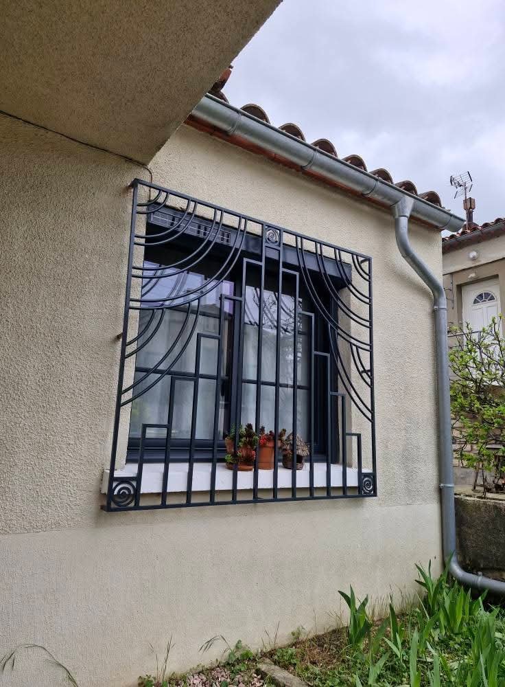 Protection fenêtre rez-de-chaussée style ferrailleur d'art