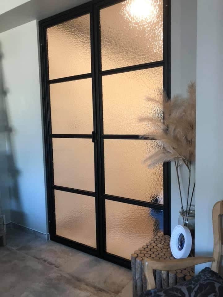 Verrière atelier d'artiste en acier fabriquée à Carcassonne